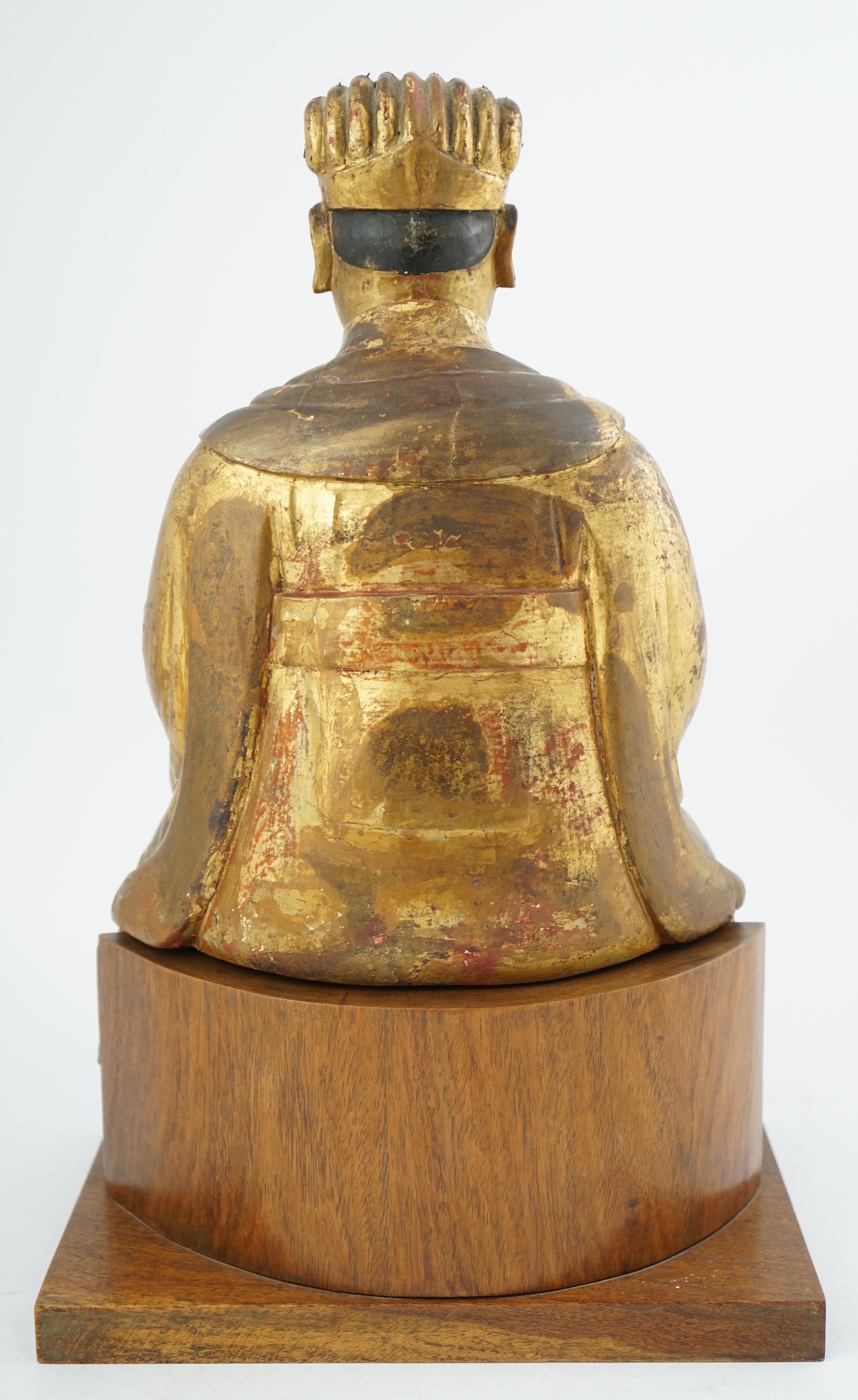 A Chinese gilt lacquered wood seated figure of Wenchang Wang, late Ming, 17th century